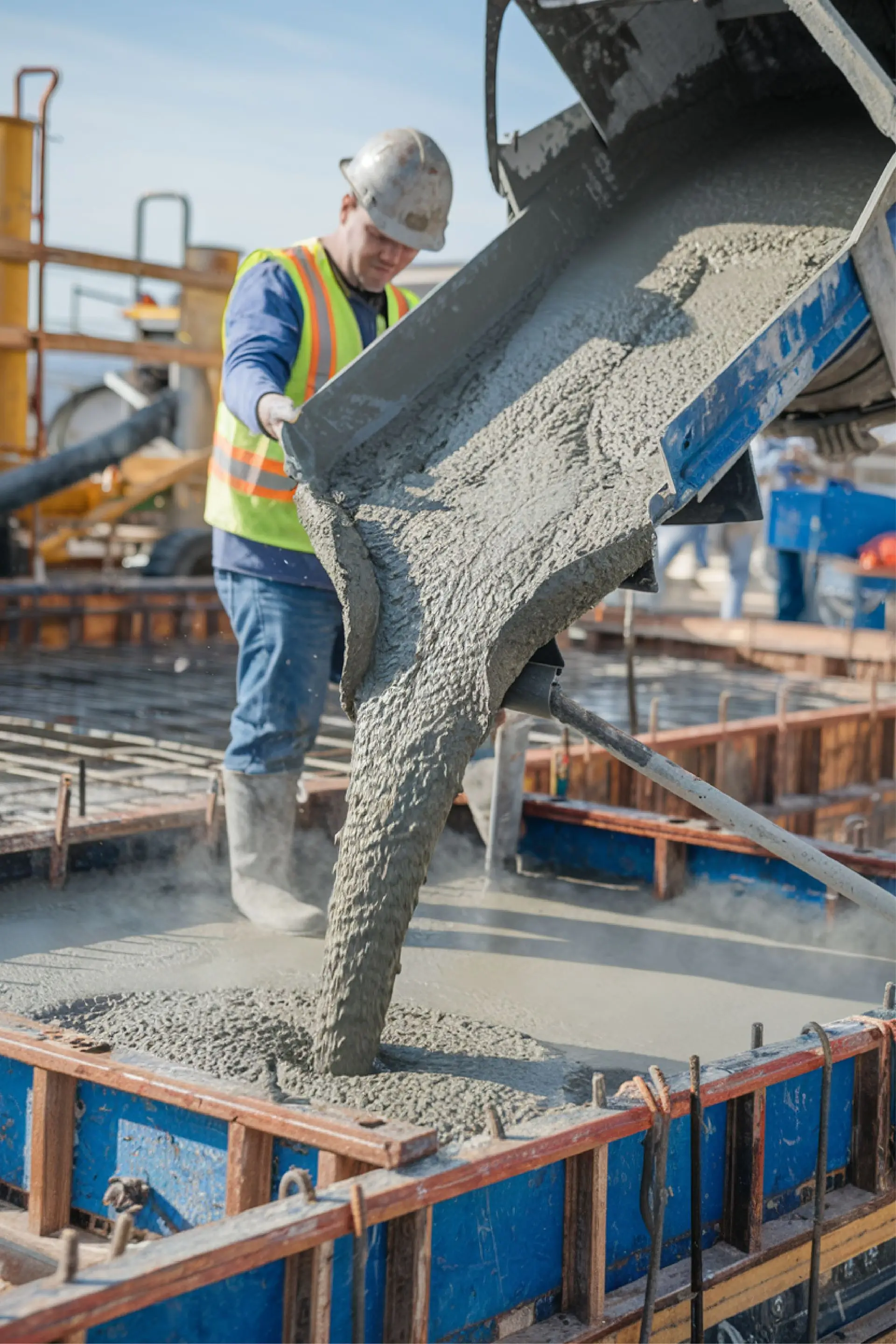 Cox Decorative Concrete worker pouring concrete